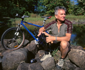 older man near bike